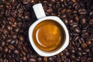 Caffeinated product coffee on cocoa seeds - caffeine make the body alert 