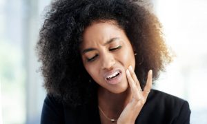 Woman Suffering Jaw Pain